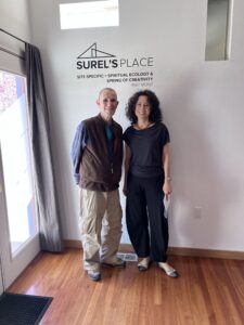 Artist-in-Residence Rafi Münz and his host, Elizabeth Rodgers, stand together at Surel's Place.